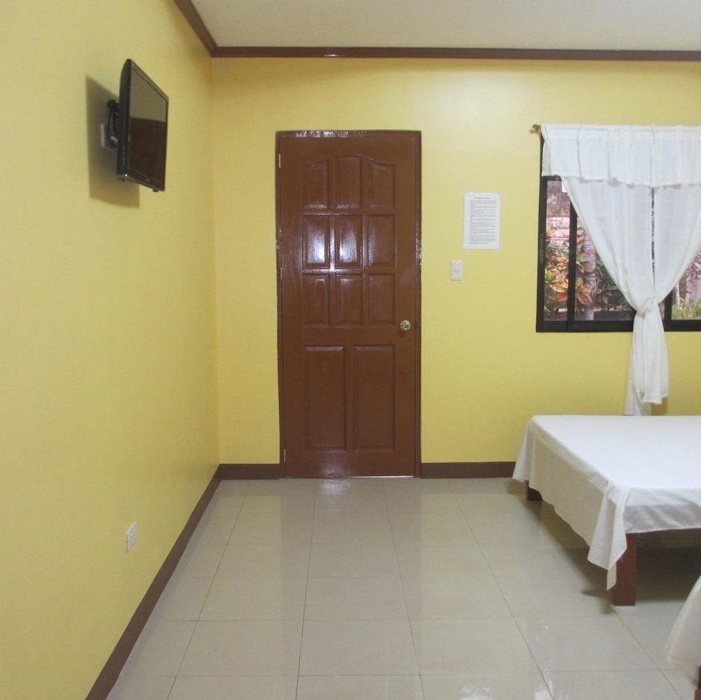 Alona Grove Tourist Inn Tawala  Екстер'єр фото